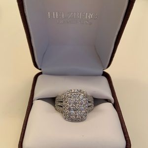 This is a size 6, 2 caret cluster diamond ring.